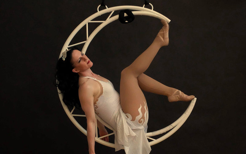 Aerial Moon - Ethereal aerial performance in a spinning crescent moon