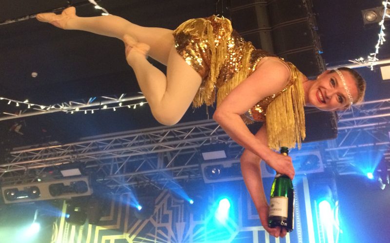 Aerial Bartending - Aerial champagne service to guests